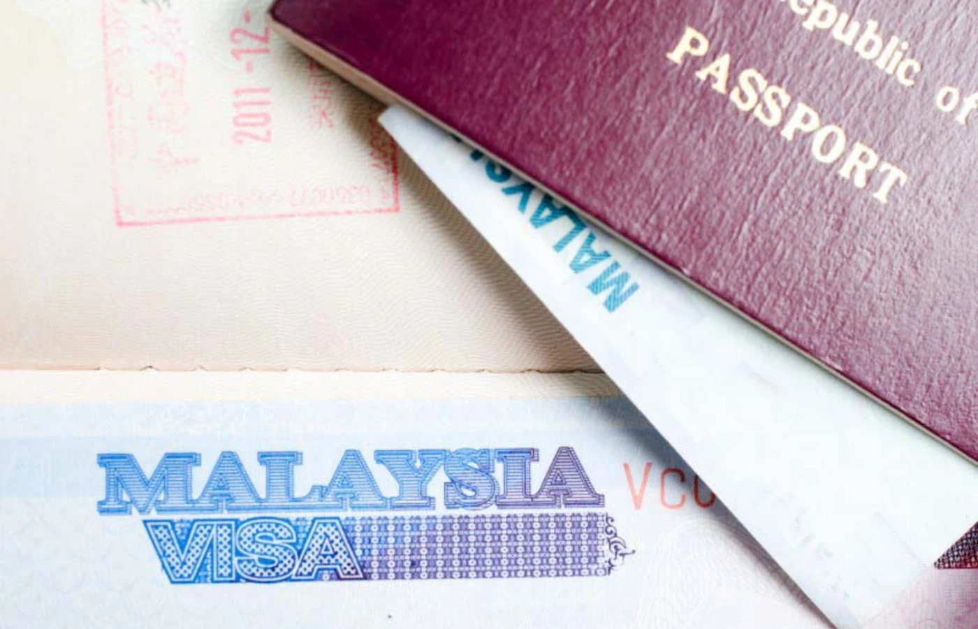 Malaysia visa photo with passport