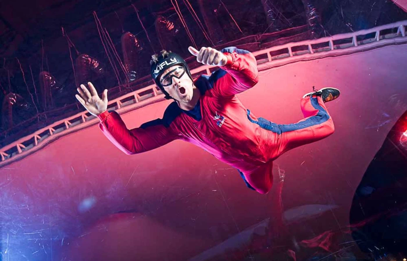 Man flying indoors at iFly Dubai during an indoor skydiving session