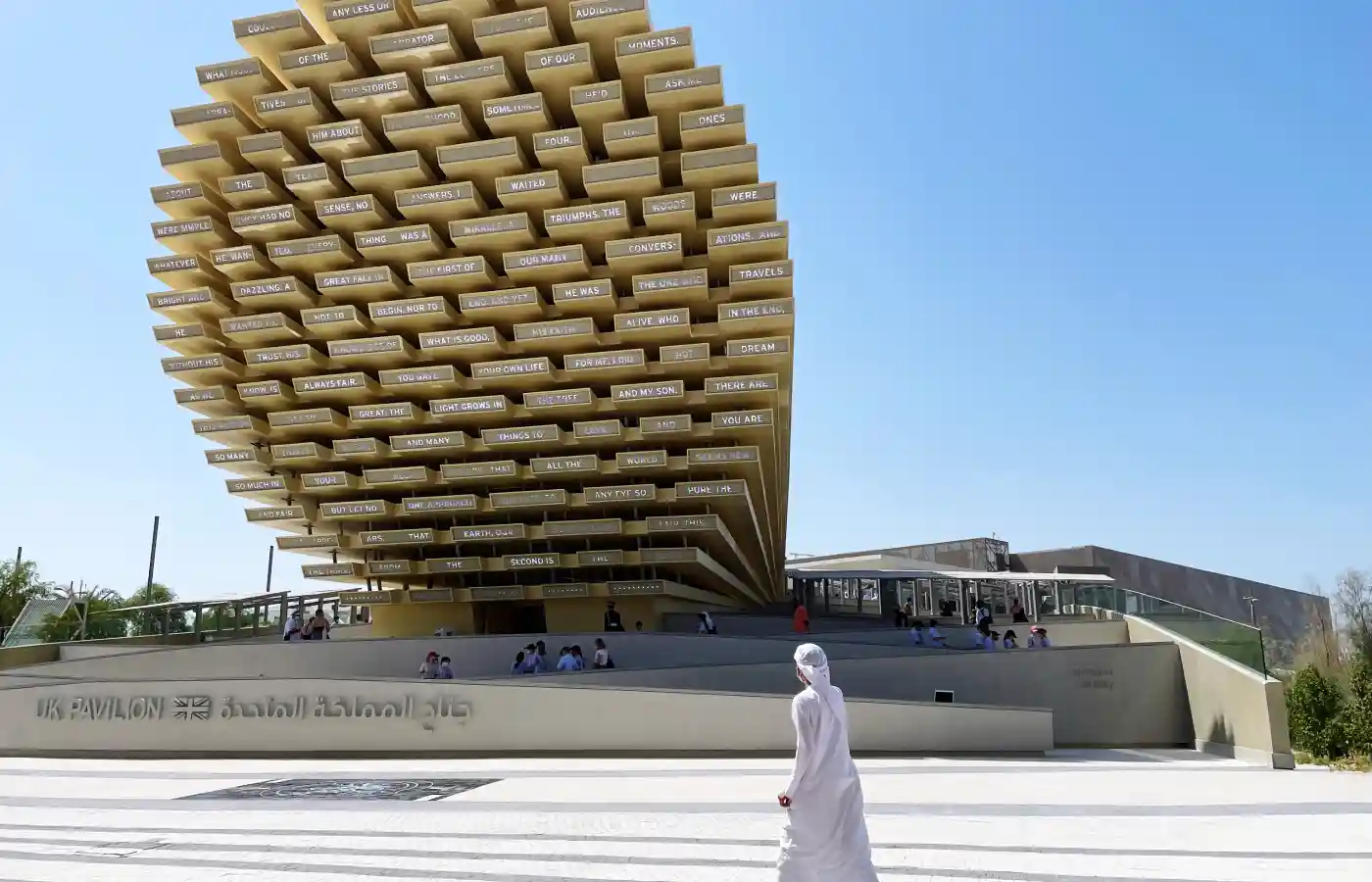 Arabic man walking in front of UK pavilion at Expo2020