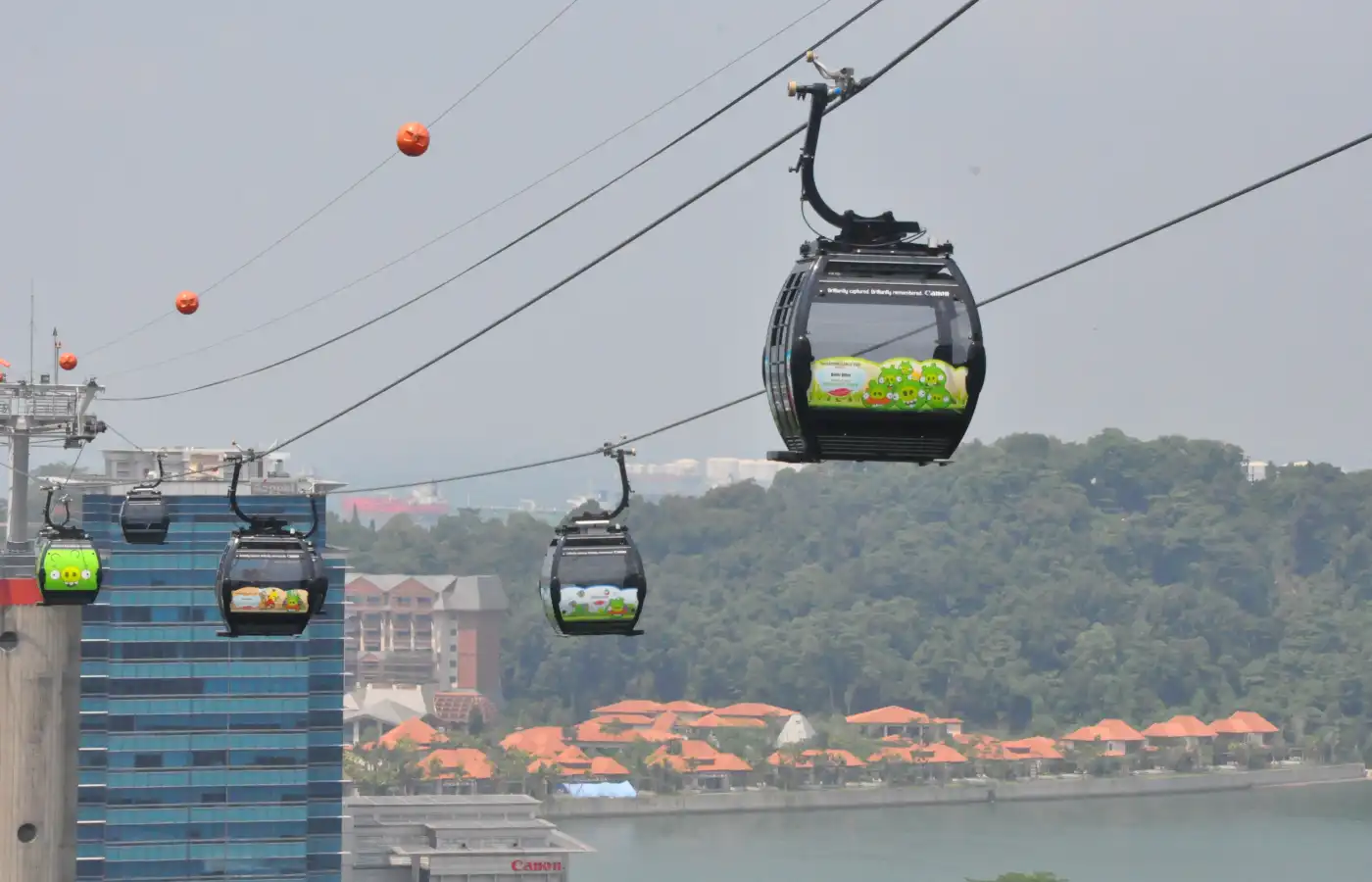 Cable cars from Singapore to Sentosa Island .