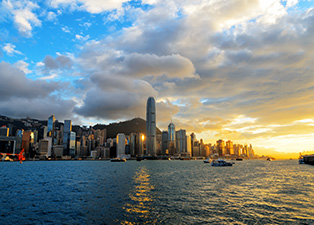 Skyline of Hong Kong at sunset.