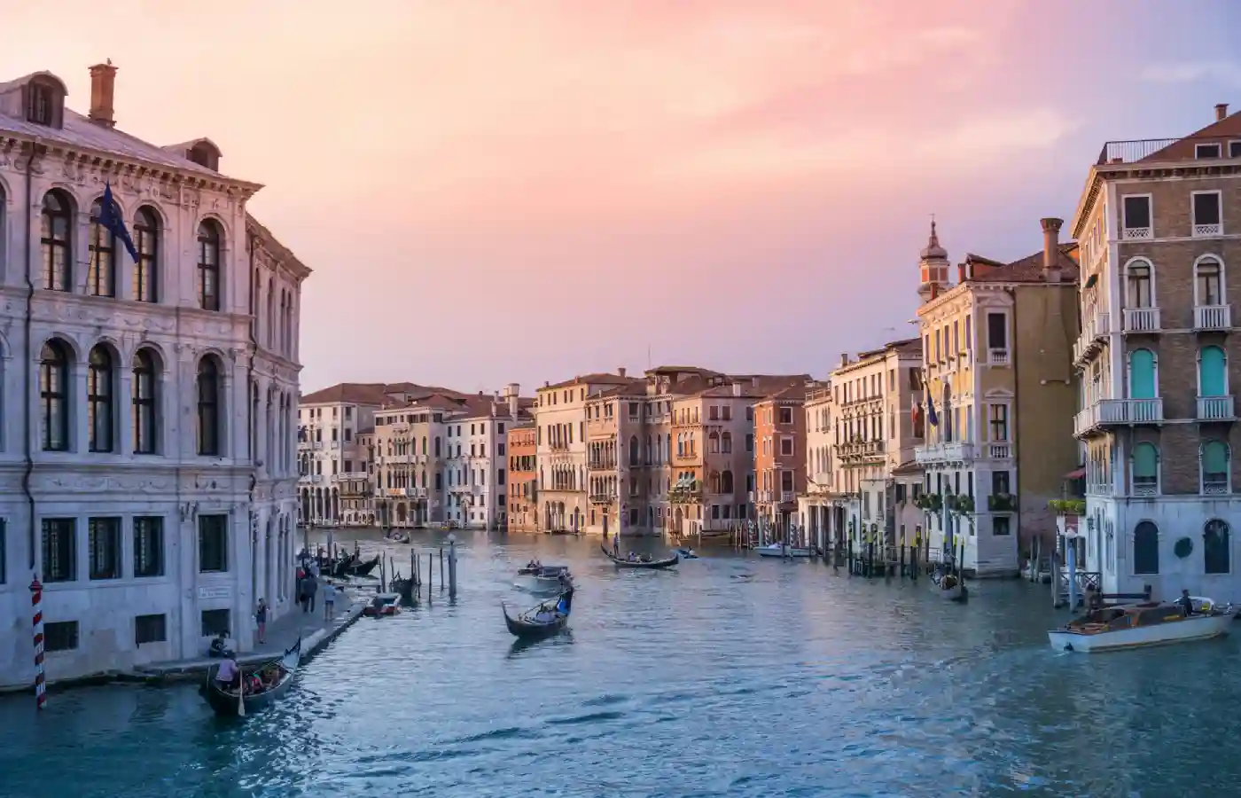 Sunset view of boats in water in Venice,Italy