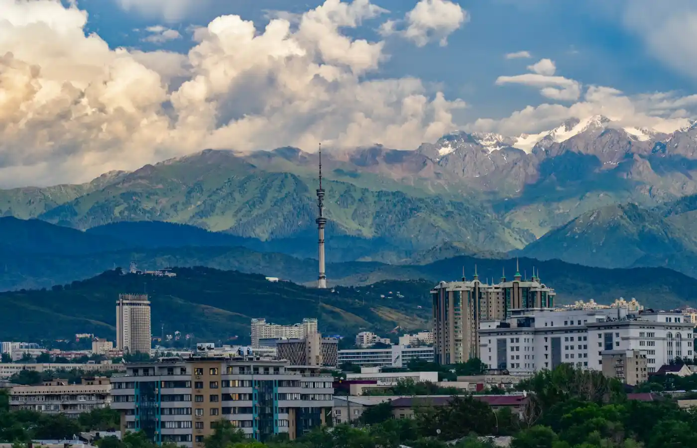 Almaty city with mountain in the background.