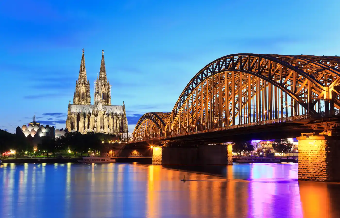 Cologne Dom and city skyline at night, Cologne, Germany