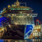 cruise ship dock on pier at night.