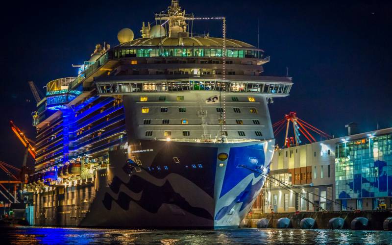 cruise ship dock on pier at night.