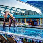 Dolphin fish at a pool in a cruise ship deck.