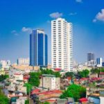 View of buildings under clear sky in Hanoi city.