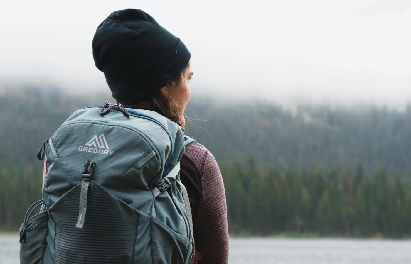Close-up Photography of Woman Carrying Gray Backpack