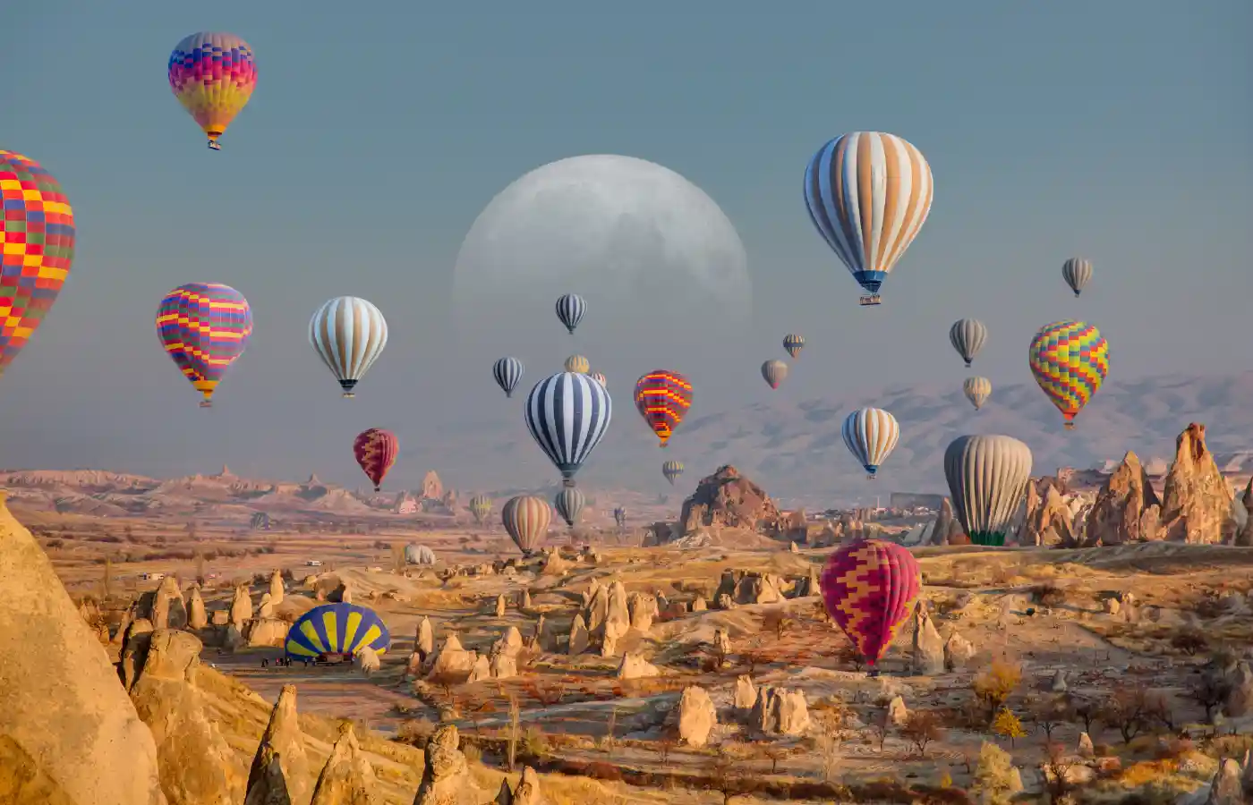 Hot air balloon flying over spectacular Cappadocia - Goreme, Turkey