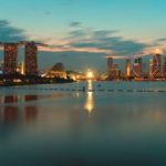 Singapore city's sunset view with a beautiful river in front.