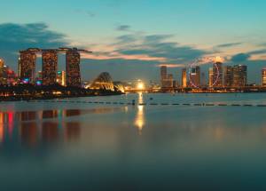 Singapore city's sunset view with a beautiful river in front.