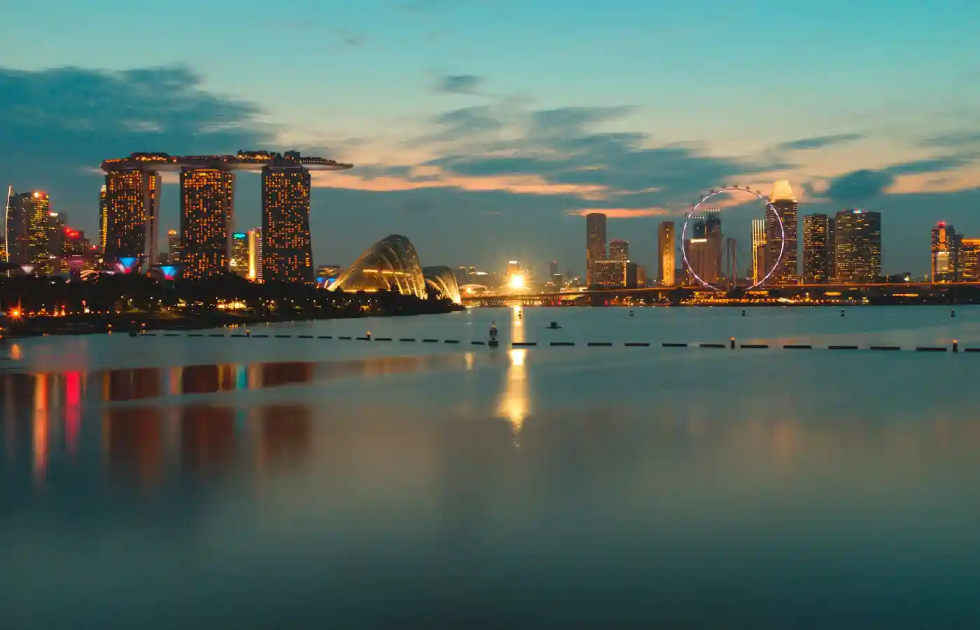 Singapore city's sunset view with a beautiful river in front.