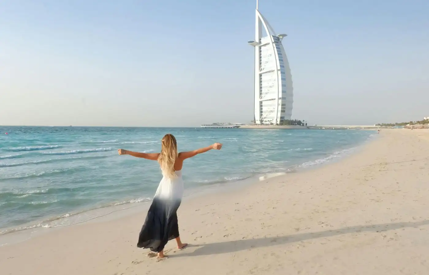 women on seashore of dubai
