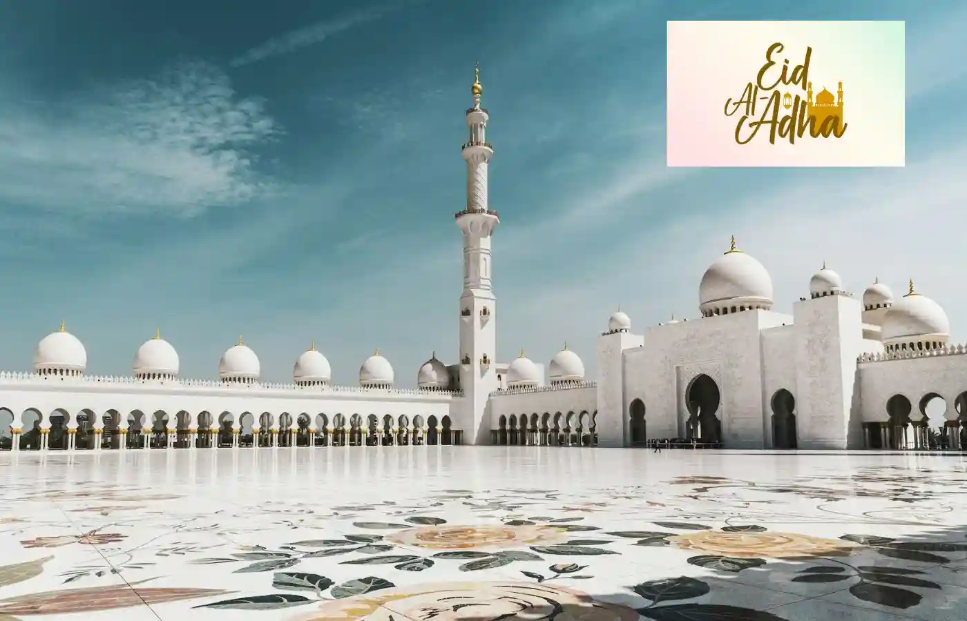Eid-Al-Adha written upon a mosque image.