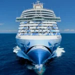 Norwegian cruise ship in water.