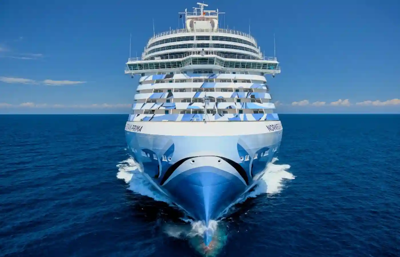 Norwegian cruise ship in water.