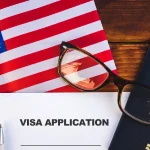 Flag of United State , visa application form and passport on table