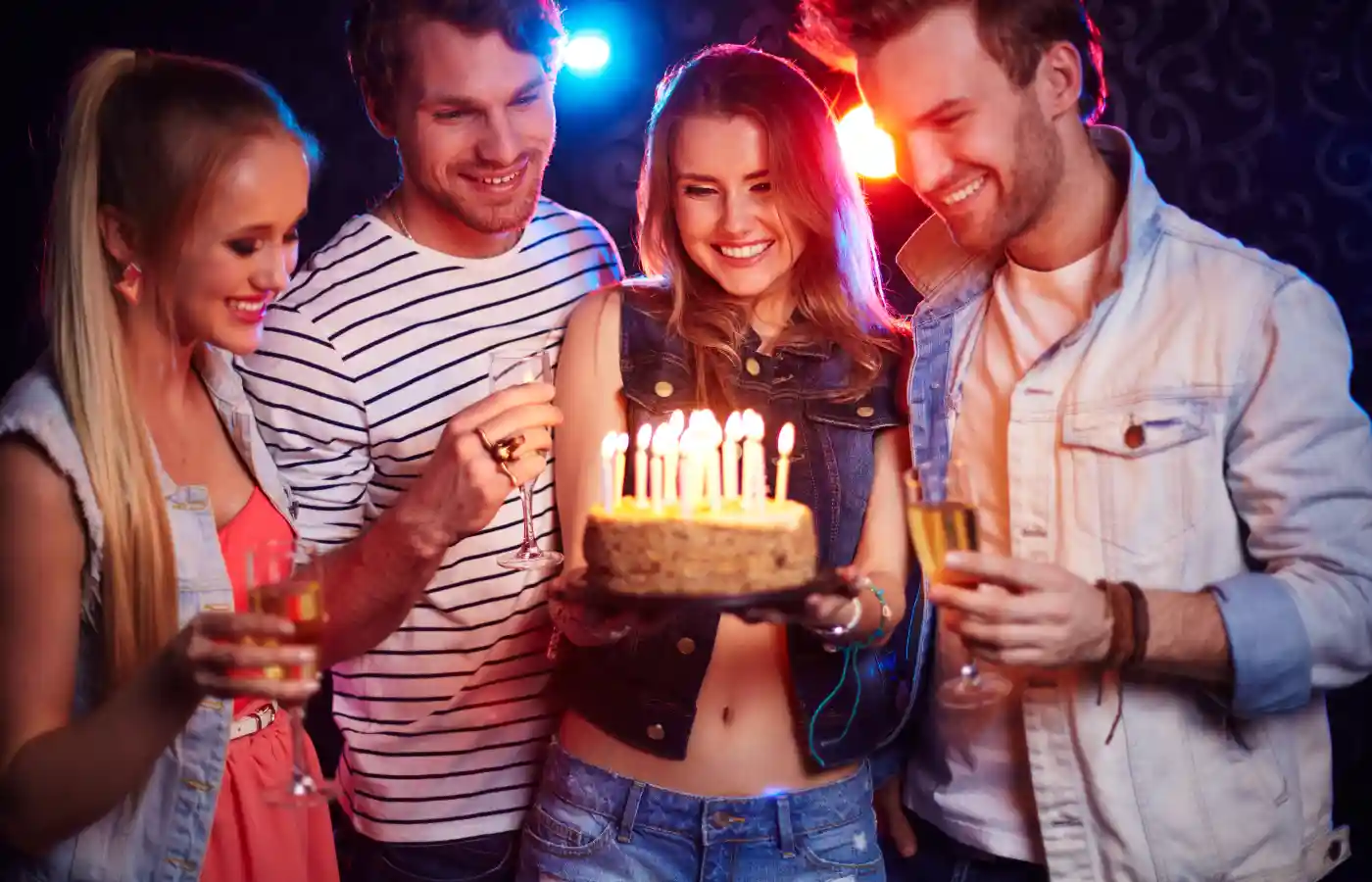 Girl holding cake in her hand.