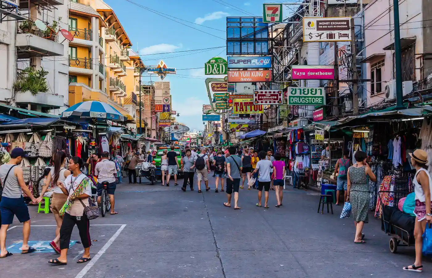 People walking at Khaosan Road in Bangkok.