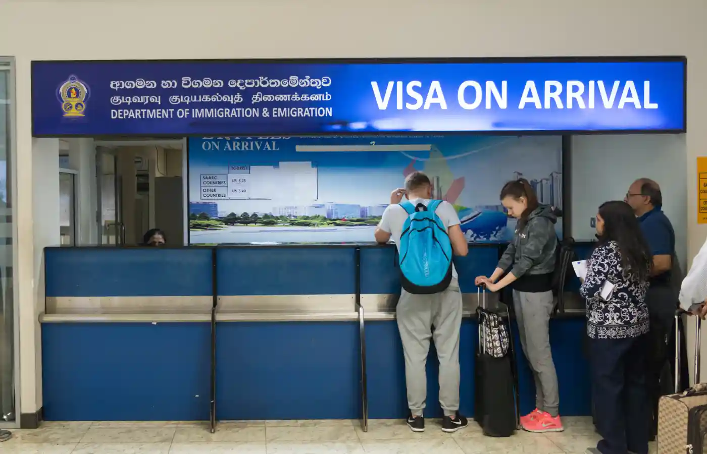 Waiting in line tourists for Visa on arrival.