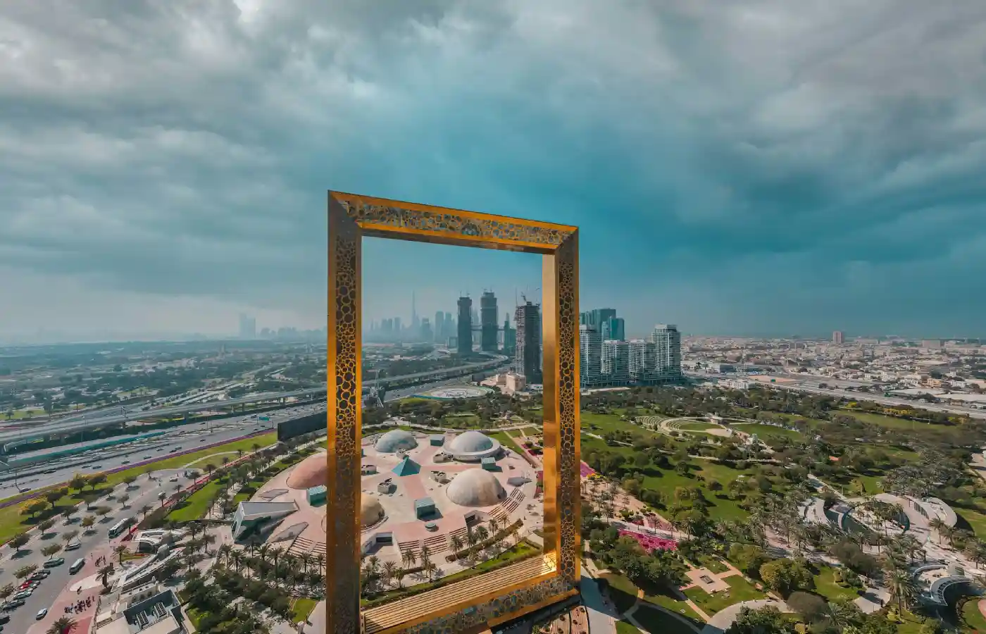 Brown wooden framed mirror on top of a building.