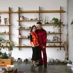 Couple holding each other and laughing.