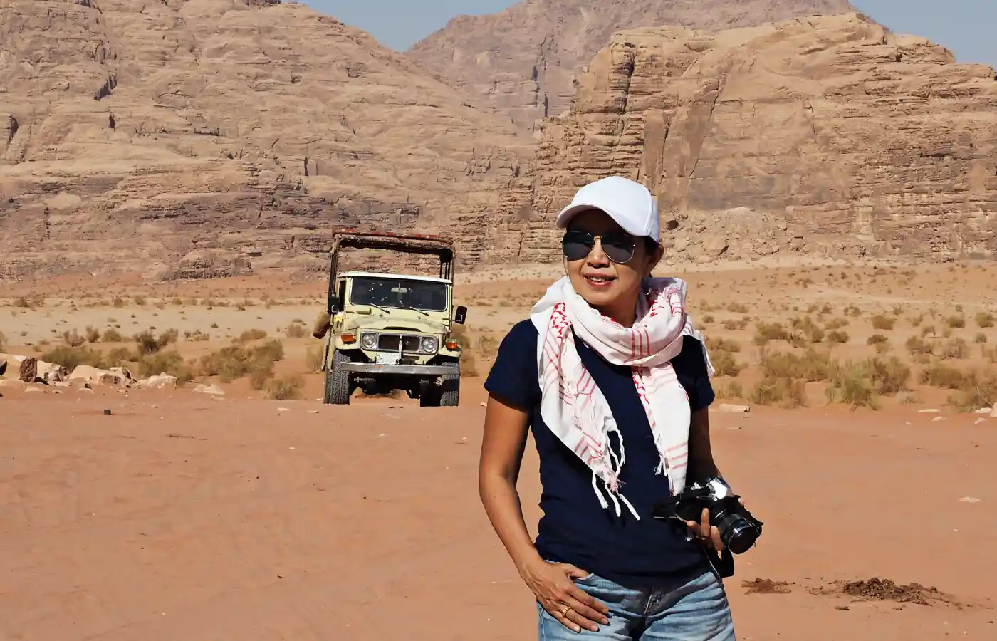 Wadi Rum desert, Jordan with safari car behind.
