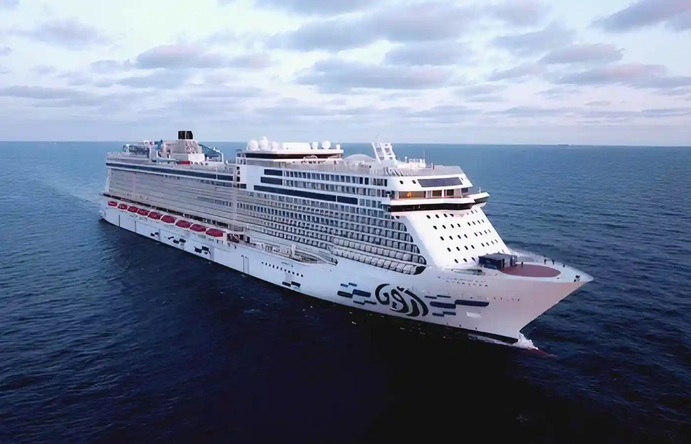 White cruise ship in the sea.