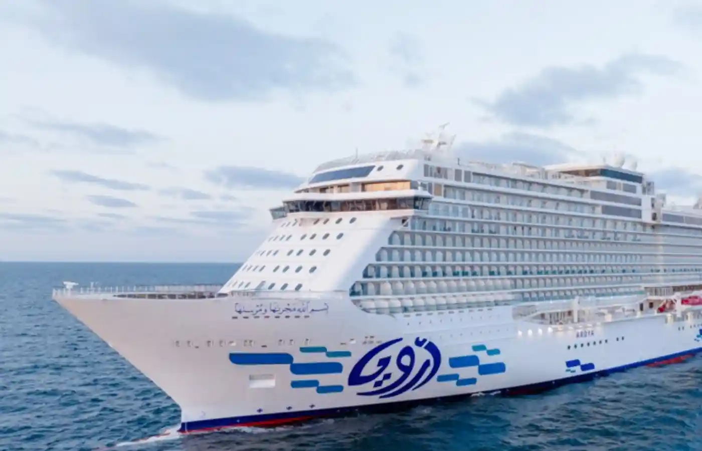 White cruise ship in the sea.