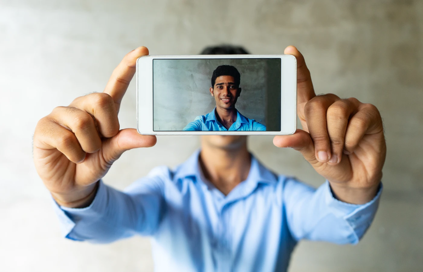 man taking photo of himself