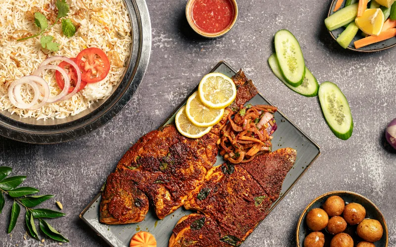 Non Vegetarian South Indian food with fish and rice to be served