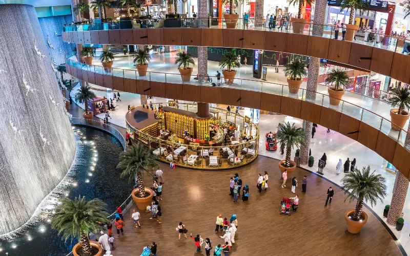 Interior of Dubai Mall with a picturesque waterfall