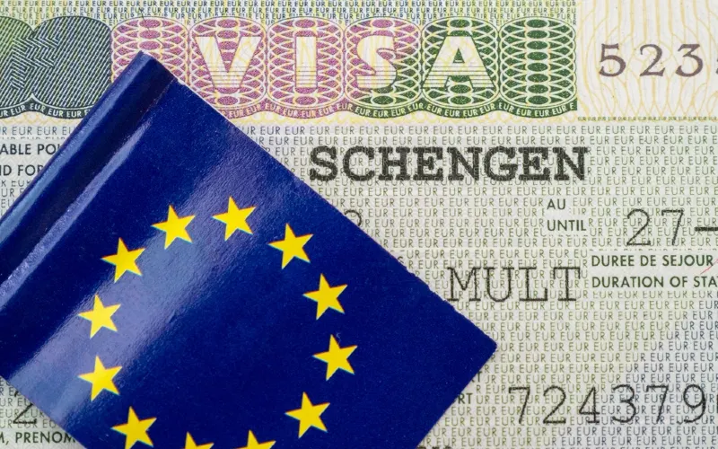 Schengen visa photo with flag