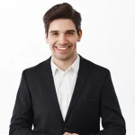 Man in suit smiling for photo