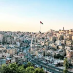 Amman roadside view with a white concrete structure