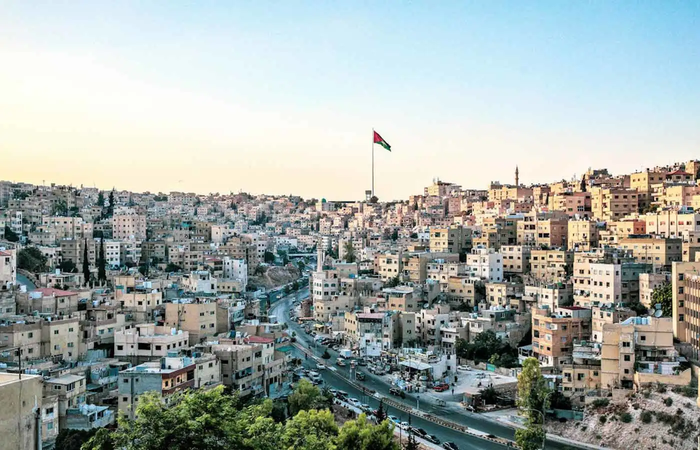 Amman roadside view with a white concrete structure