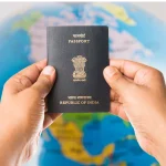 Person holding an Indian passport