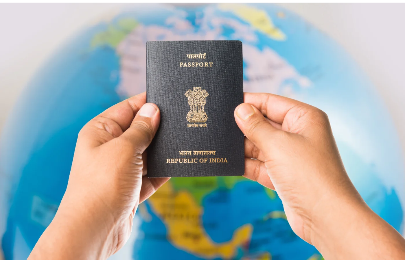 Person holding an Indian passport