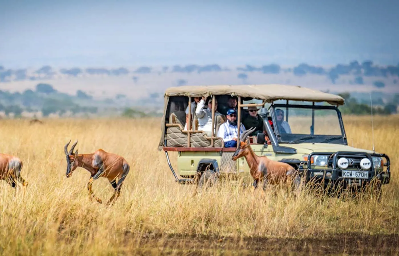 Tourist enjoying a safari experience in Kenya.